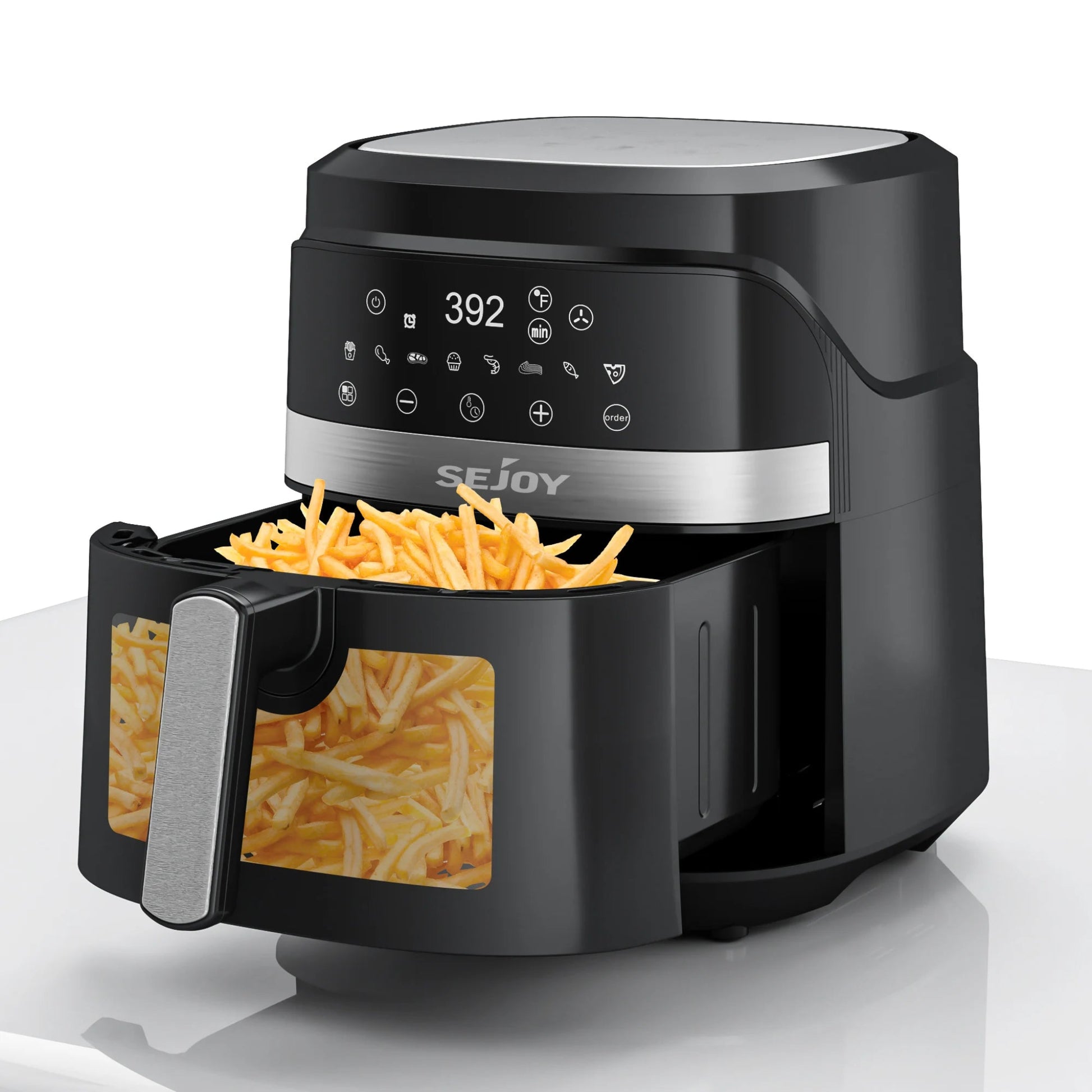 Black air fryer with digital display showing temperature, filled with food on a white background